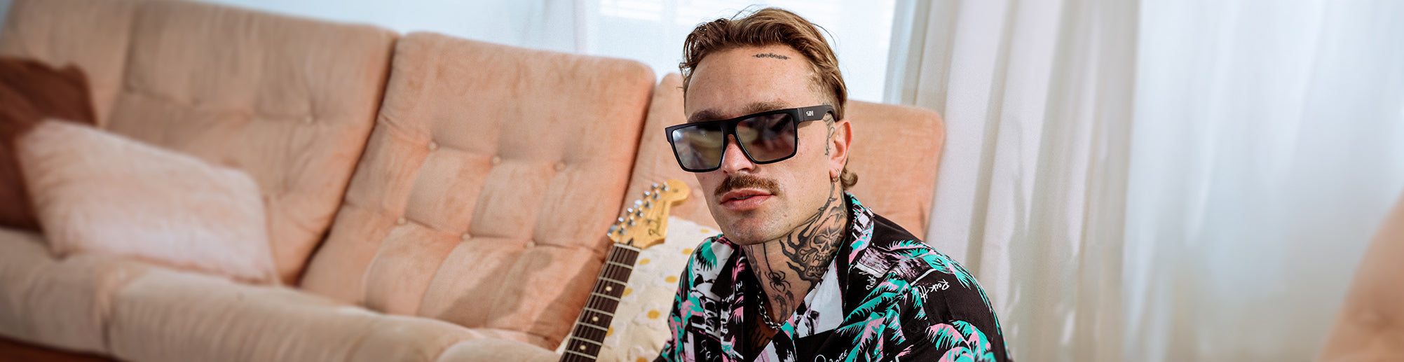 male model wearing matte lens sunglasses