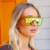 CANNON BALL Polarised Orange Mirrored Shield Sunglasses made of recycled plastic close up on female model
