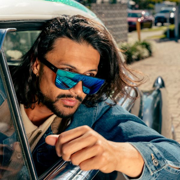 CANNON BALL Polarised Shield Sunglasses with Blue Mirror on a male model