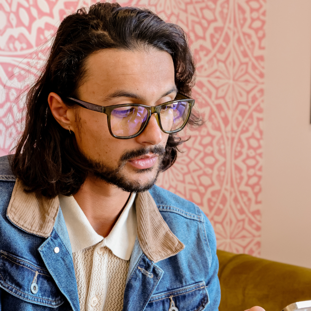Game Changer Square Blue Light Glasses with Green Frame right view on a male model