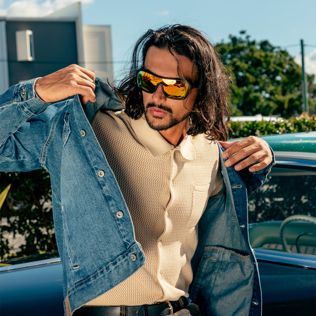 JACKPOT Polarised Orange Shield Sunglasses on a male model