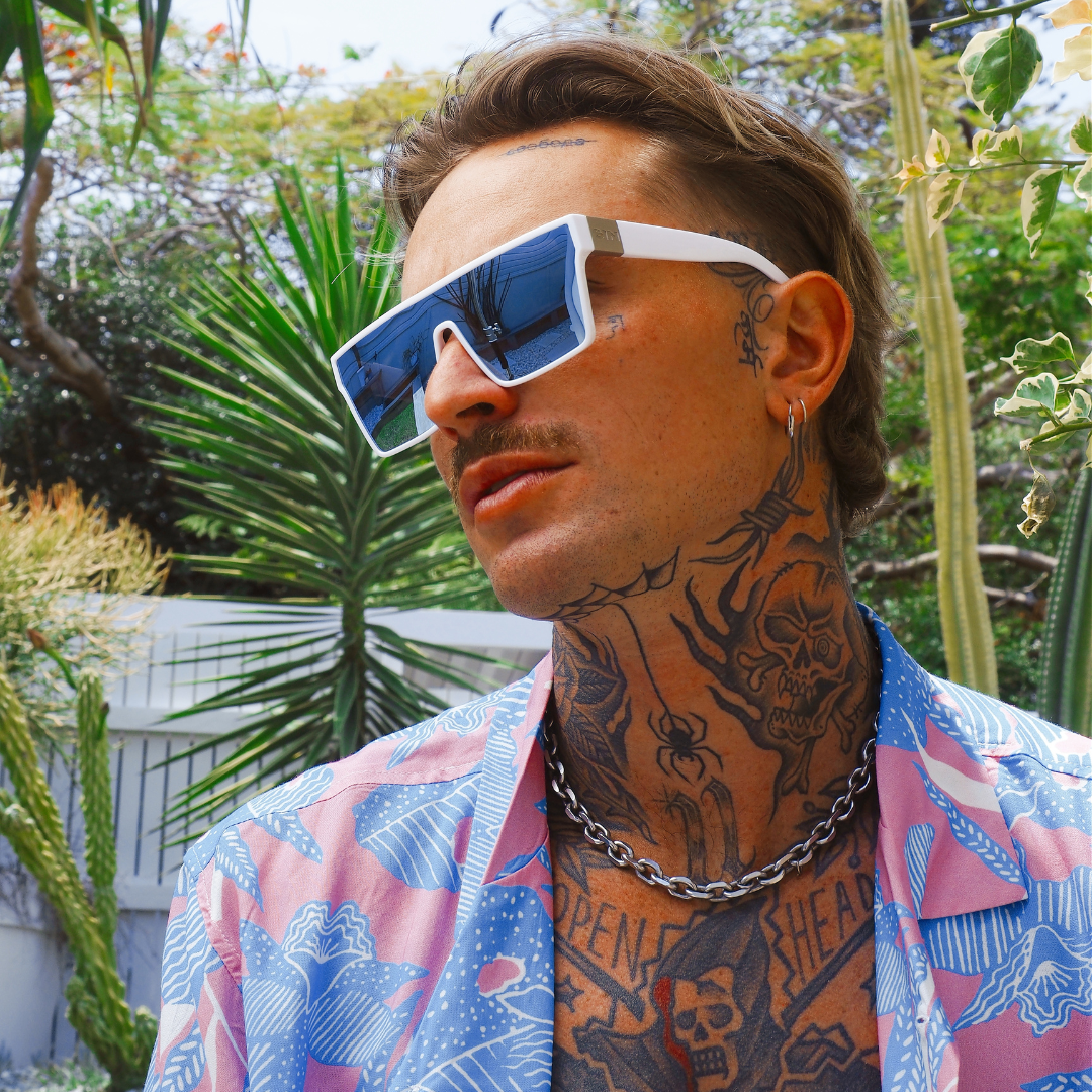 LOOSE CANNON Polarised White Shield Square Sunglasses with Blue Mirrored Lens on a male model