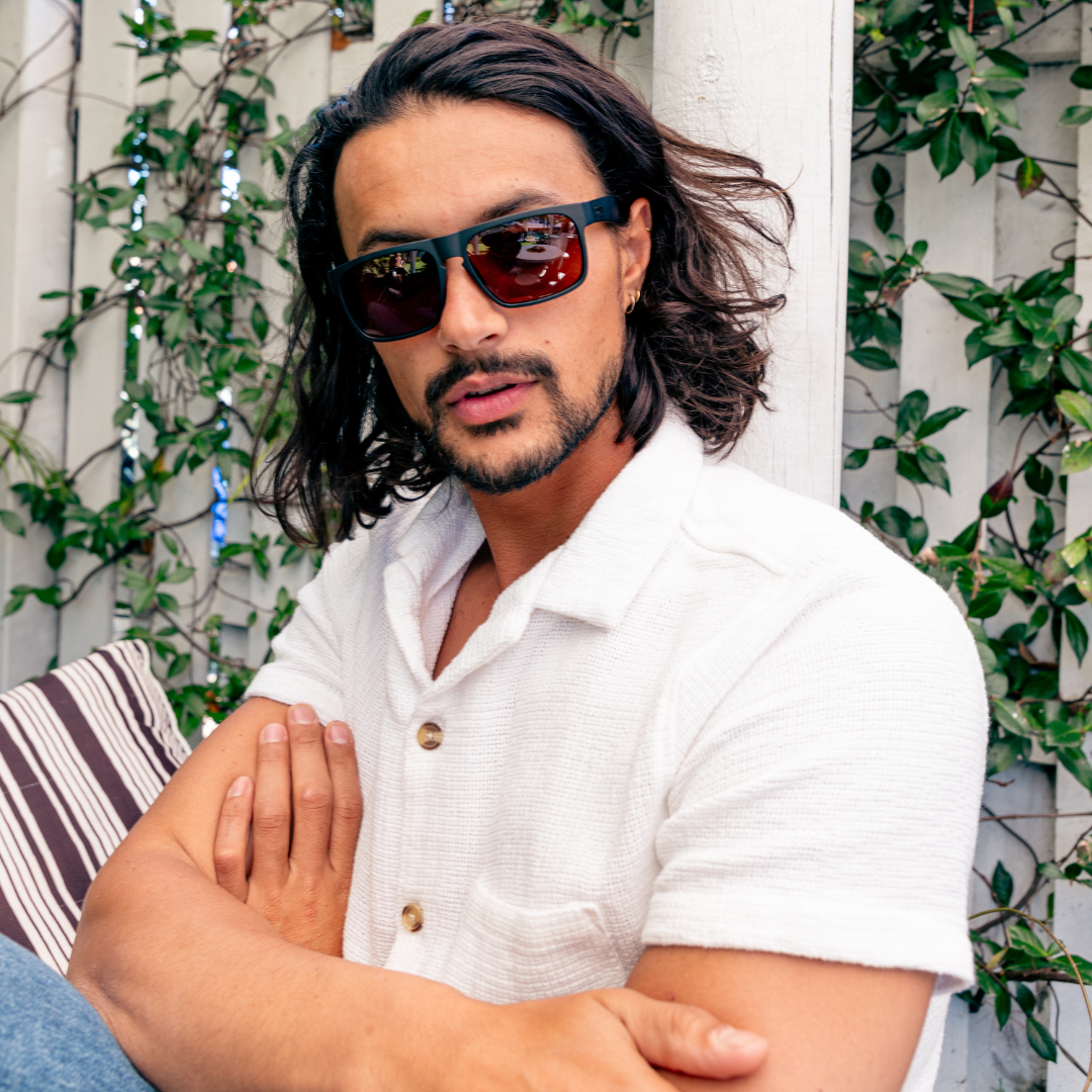 Peccant Polarised Black Rectangle Sunglasses with Brown Lens on a male model