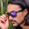Peccant Rectangle Sunglasses with Black Frame and Purple Matte lens side view on male model