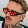 Reefer Polarised Black and Red Wrap Around Sunglasses made of recycled plastic close up on male model