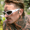 Reefer Polarised White Wrap Around Sunglasses made of recycled plastic on male model looking side on