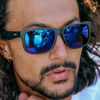 Riot Polarised Matt Black Rectangle Sunglasses with Blue Lens on a male model