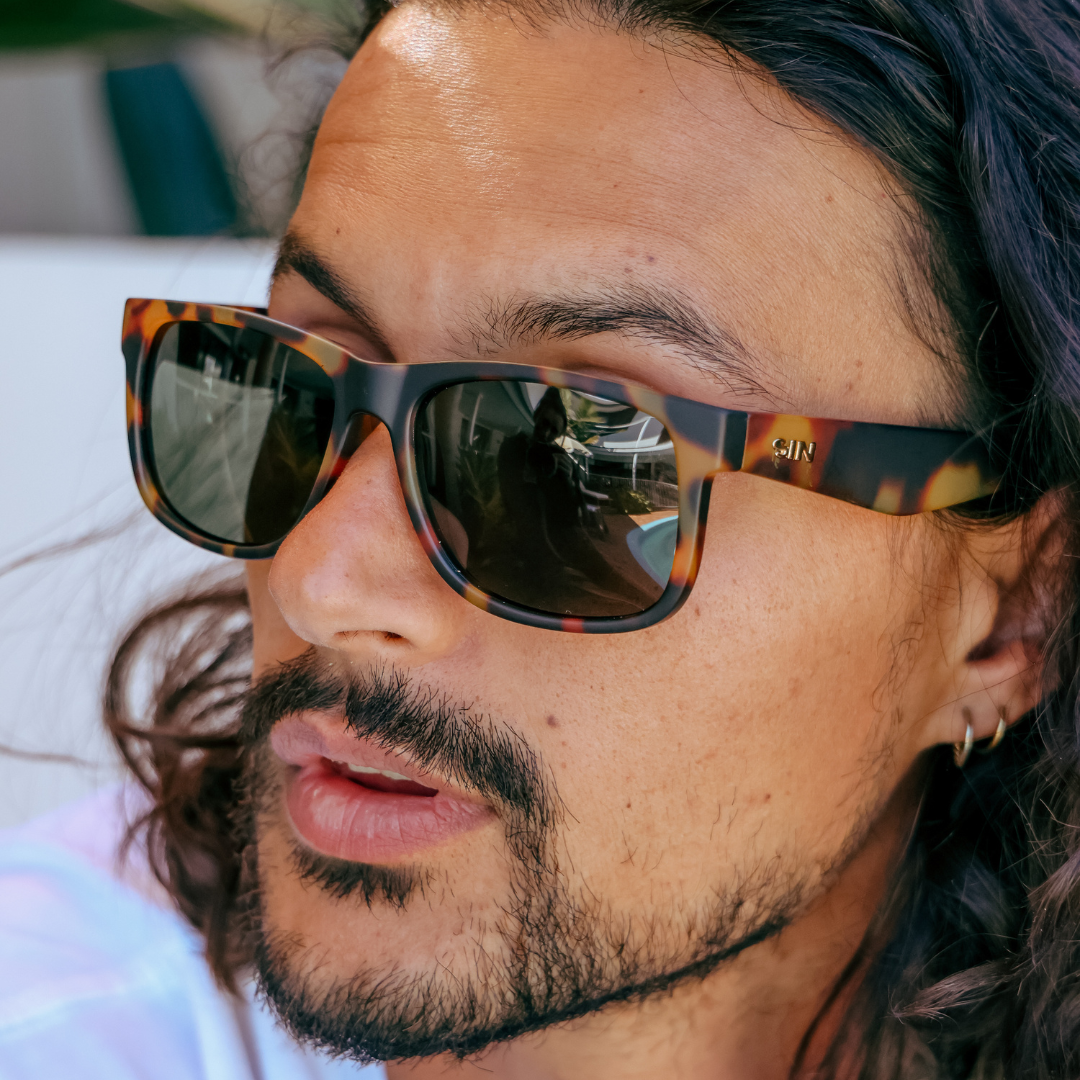 Riot Polarised Tort Rectangle Sunglasses side view on a male model