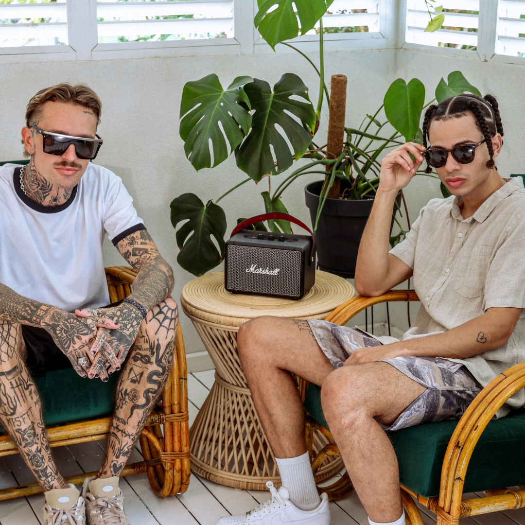 Risky Business Polarised Tortoise Shell Round Sunglasses on a male model sitting on a chair