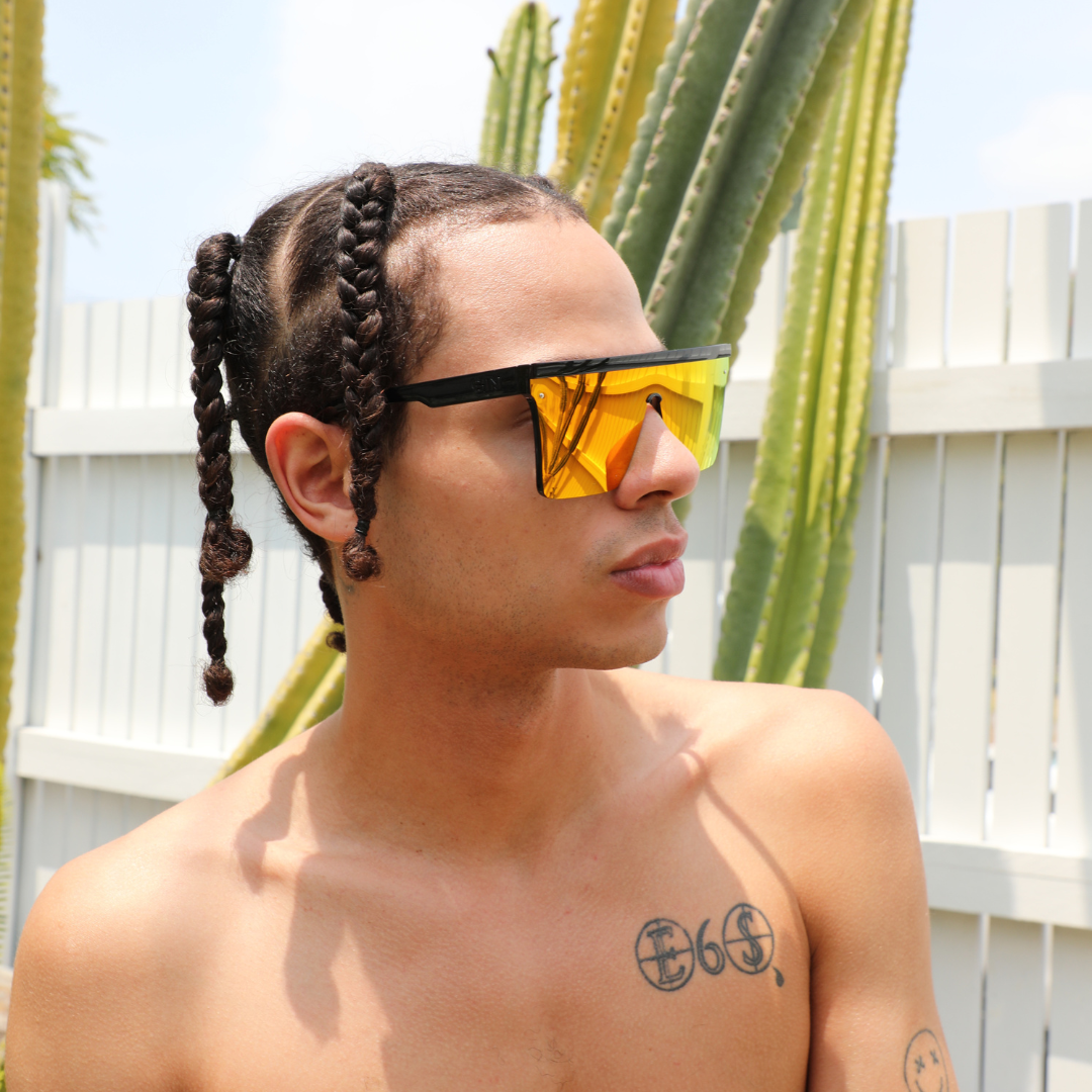 THE BAR Polarised Black Square Red Sunglasses on a male model looking to his side