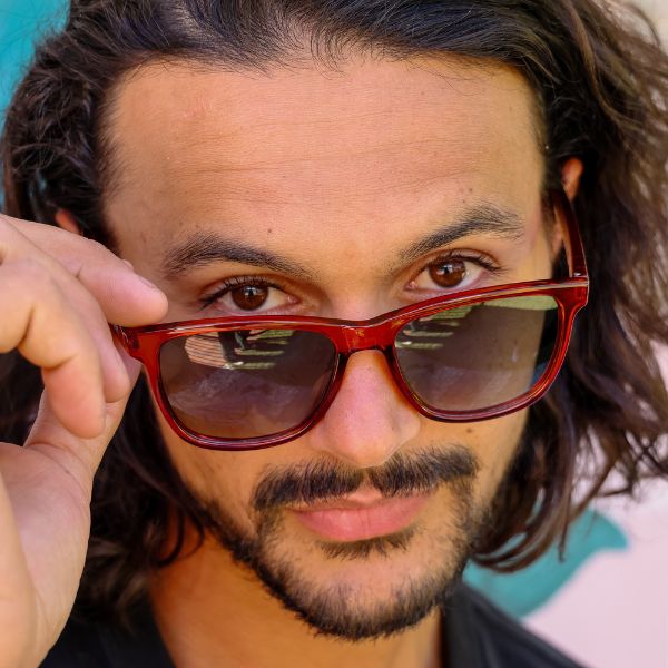 The Game Changer Polarised Brown Square Sunglasses on a male model showing his eyes