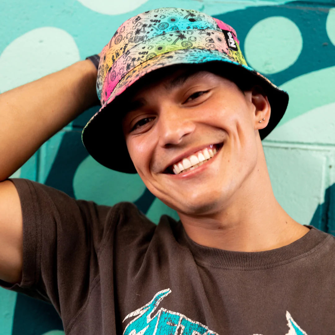 Fresh Prints Reversible Bucket Hat on a male model