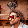LOOSE CANNON Polarised Red Shield Square Sunglasses side view on a male model