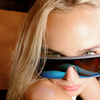 LOOSE CANNON Polarised Shield Square Sunglasses with Grey Frame and Blue Mirrored Lens close up on a female model