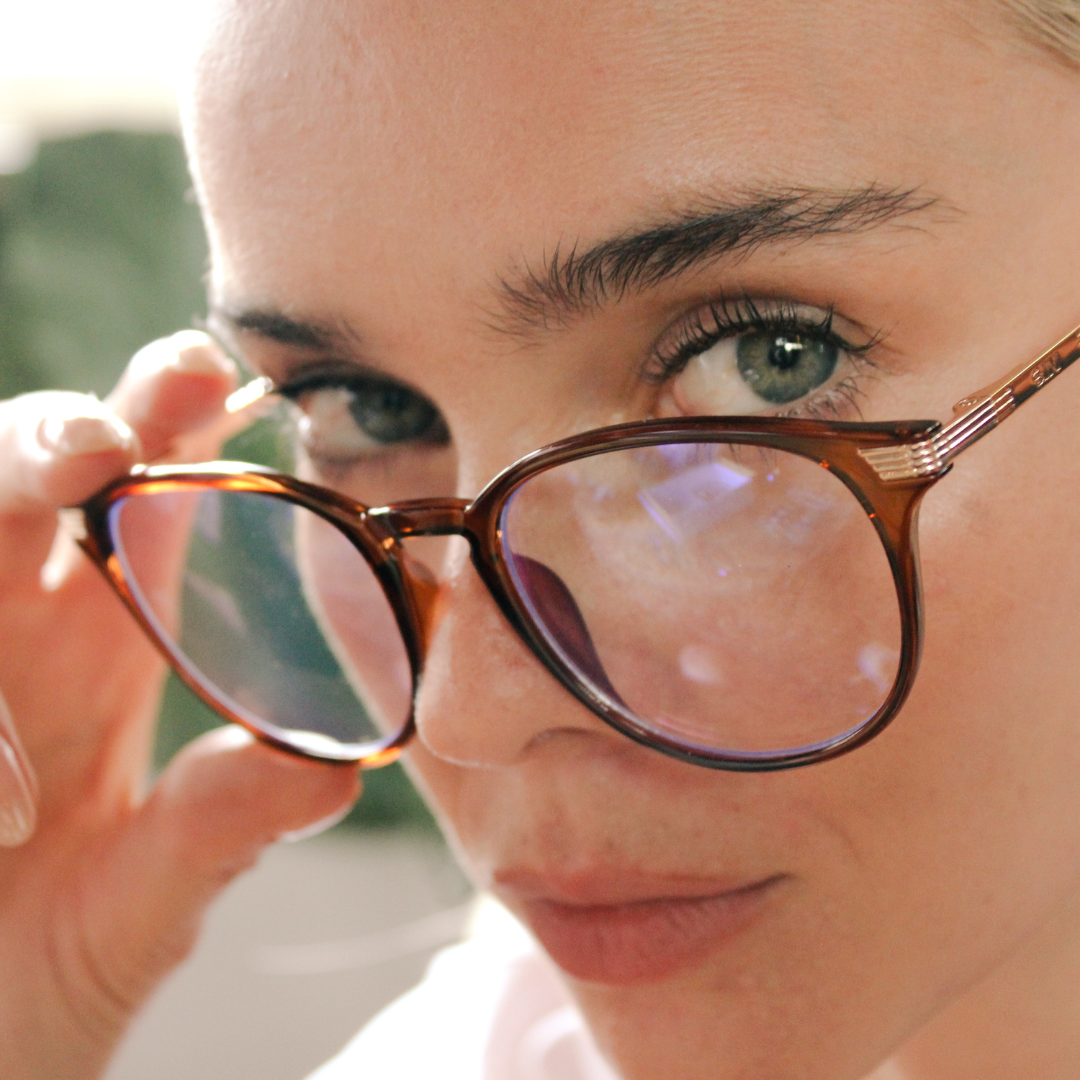 Love Child Brown Round Blue Light Glasses on a female model