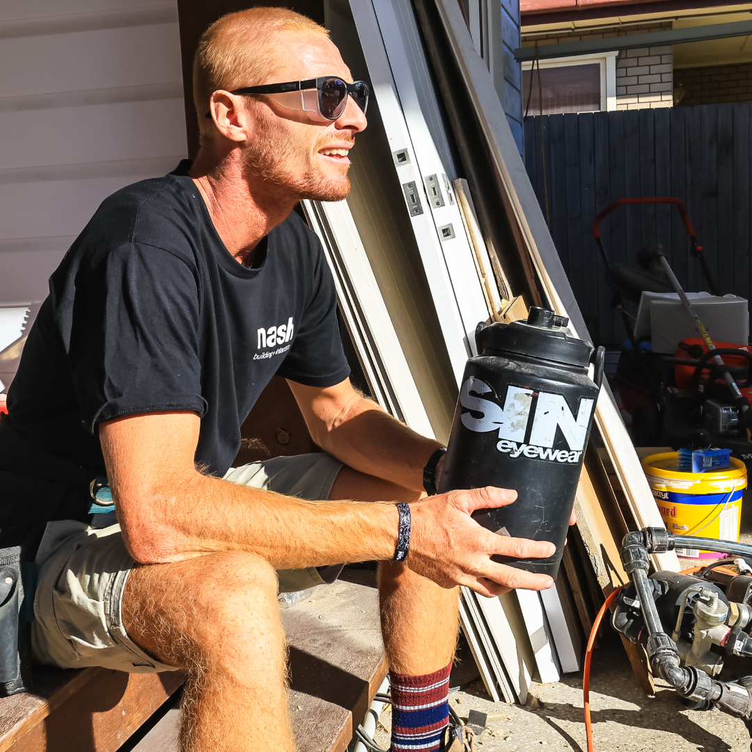 Safe & Sound Black Wrap Around Medium Impact Resistant Safety Sunglasses side view on a Male Tradie