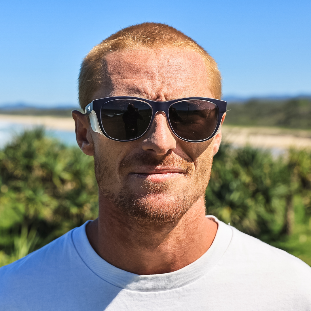 Safe & Sound Navy Wrap Around Safety Sunglasses Medium Impact Resistant on a Male Tradie