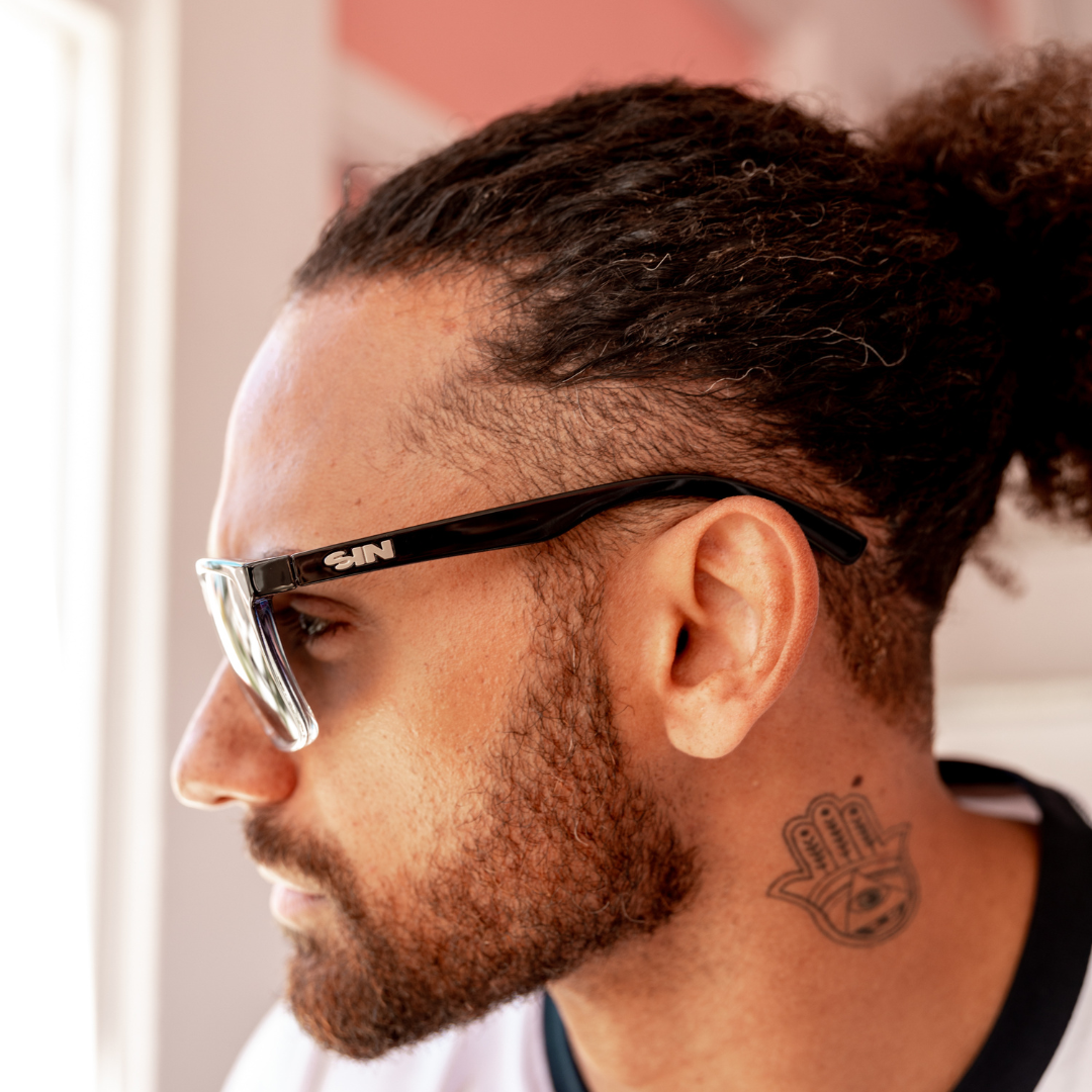 Skylark Polarised Black Rectangle Sunglasses side view on a male model