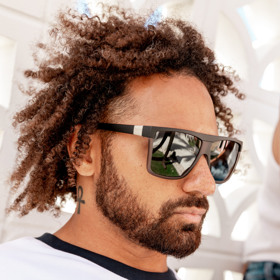 UNDERTOW Polarised Black and Grey Square Sunglasses on a male model