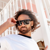 Vespa II Polarised Black Square Sunglasses on a male model