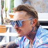 CANNON BALL Polarised Silver Shield Flat Top Sunglasses made of recycled plastic on male model looking sideways