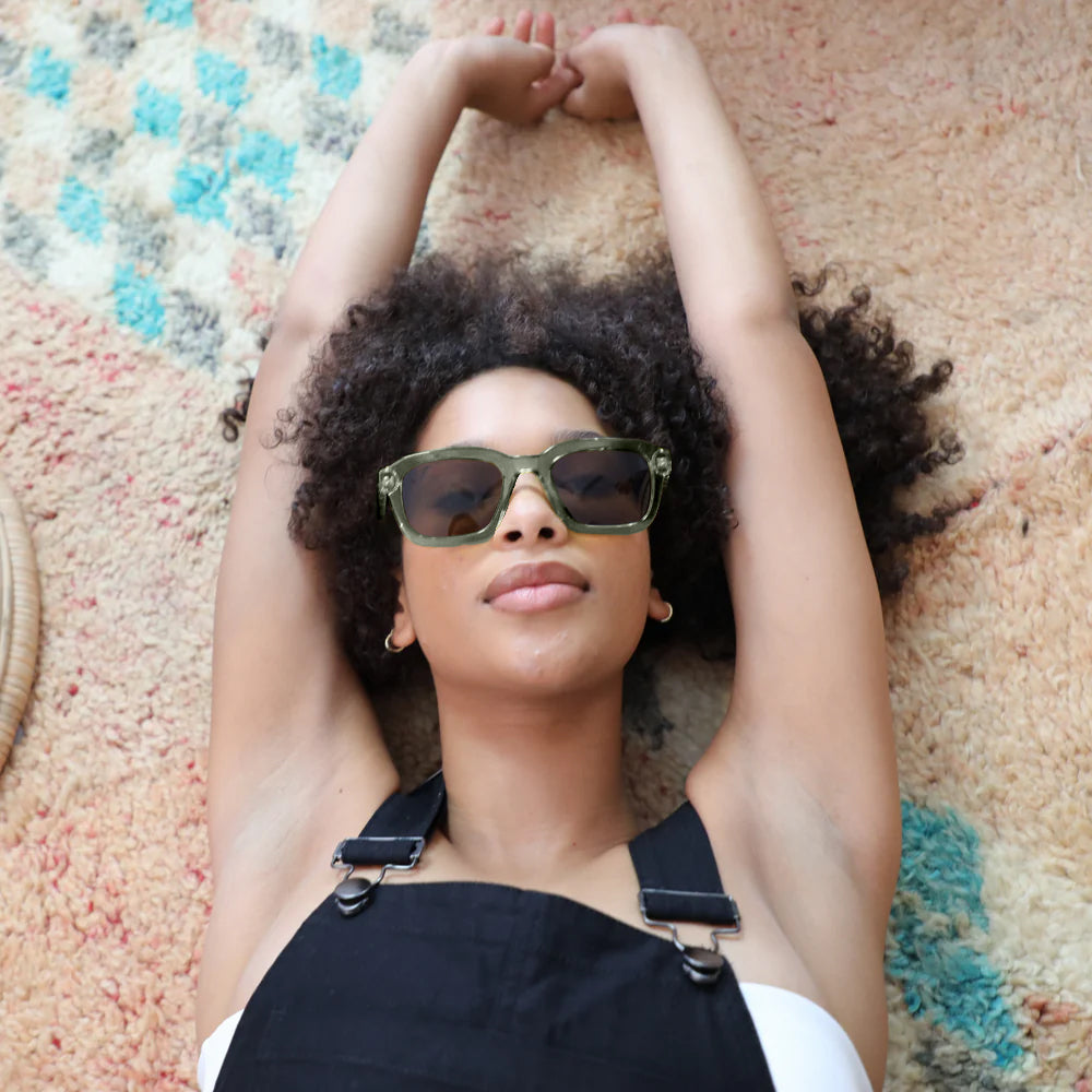 Chiller Polarised Green Square Sunglasses on a female model
