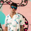 JACKPOT Polarised Blue Shield Sunglasses on a male model in front of a graffiti wall