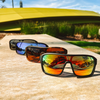 JACKPOT Polarised Orange Shield Sunglasses laid out with other colours