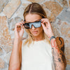 LOOSE CANNON Polarised Silver Shield Square Sunglasses on a female model
