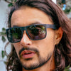 Peccant XL Polarised Black Rectangle Mens Sunglasses on a male model