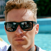 Riot Polarised Matt Black Rectangle Sunglasses on a male model