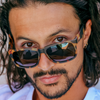Riot Polarised Tort Rectangle Sunglasses close up on a male model
