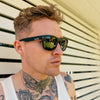 SPARTAN Polarised Black Rectangle Floating Sunglasses side view on male model