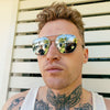Male model with tattoos wearing a pair of Maverick - Silver Silver sunglasses