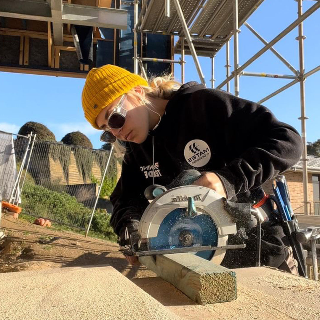 Safe & Sound Clear Wrap Around Safety Glasses Medium Impact Resistant side view on a female Tradie in a beanie