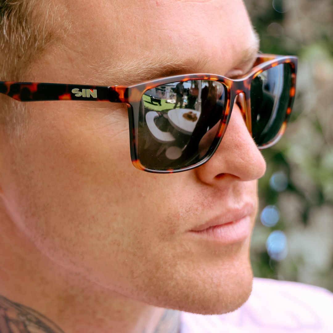 Skylark Polarised Tortoise Shell Rectangle Sunglasses left side view on a male model