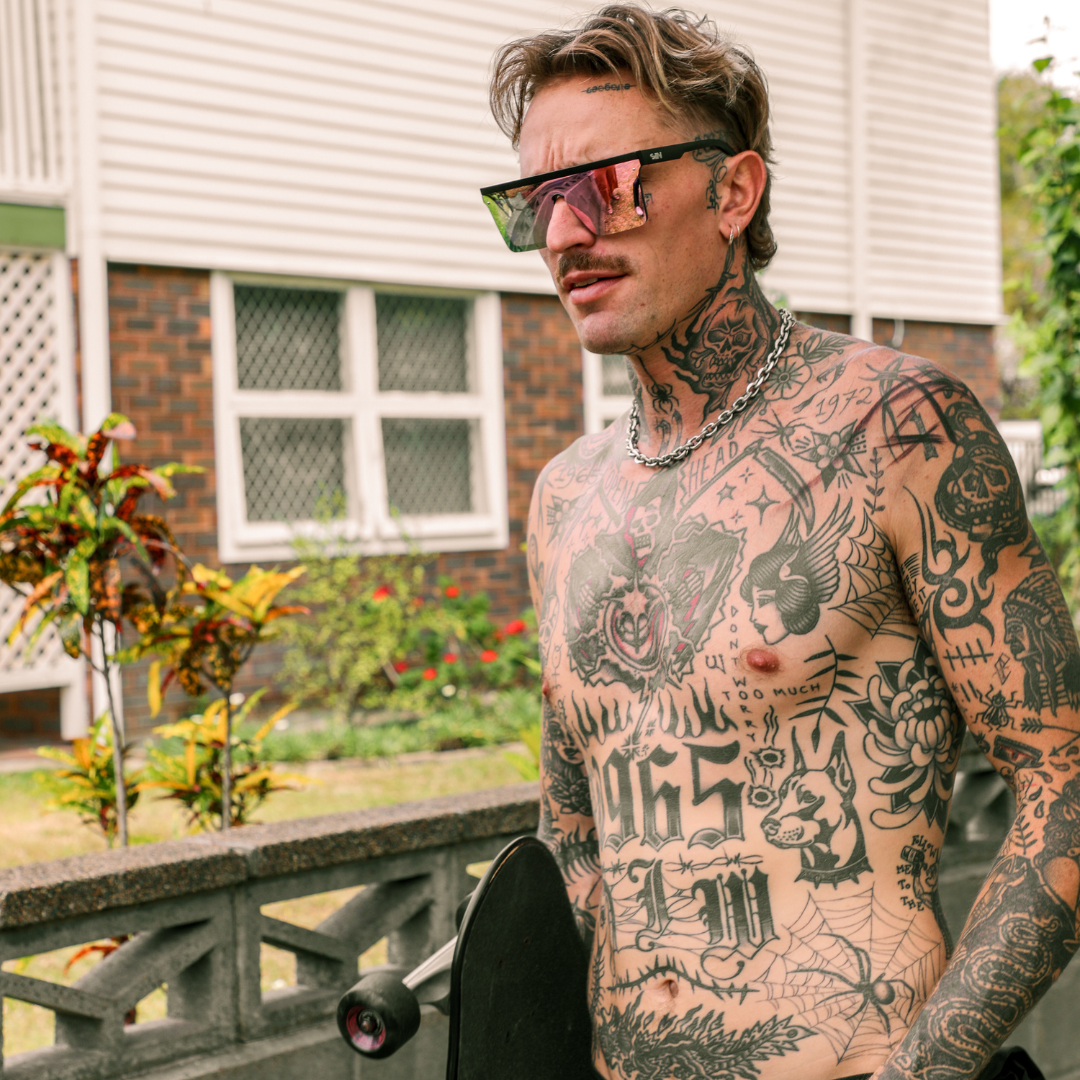 THE BAR Polarised Black Square Pink Sunglasses on a male model