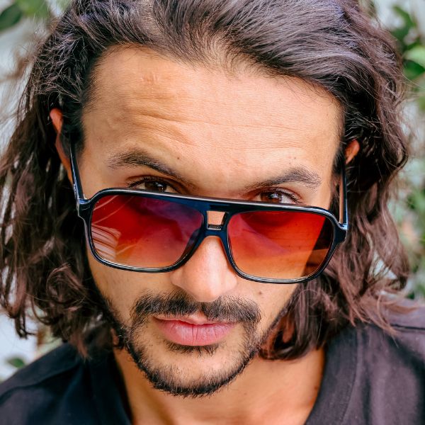 THE DUKE Brown Aviator Sunglasses close up on a male model
