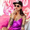 Vegas Polarised Pink Round Sunglasses on a female model
