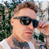 WAYWARD Polarised Matt Black Rectangle Floating Sunglasses on a male model
