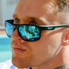 WAYWARD Polarised Mirrored Blue Wrap Around Sunglasses side view on a male model