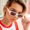 Ahoy Polarised Rectangle Sunglasses with White Frame on a female model