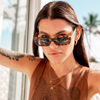 Ahoy Polarised Tort Rectangle Sunglasses on a female model