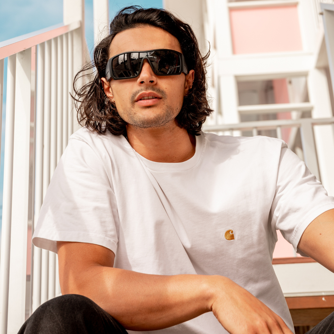 Blaze Polarised Black Wrap Around Sunglasses close up view on a male model