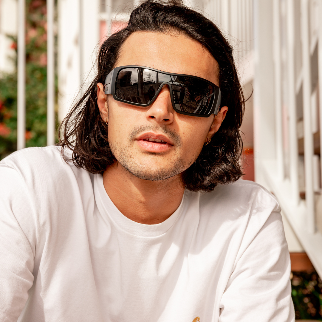 Blaze Polarised Black Wrap Around Sunglasses on a male model