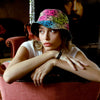 Fresh Prints Reversible Bucket Hat on a female model