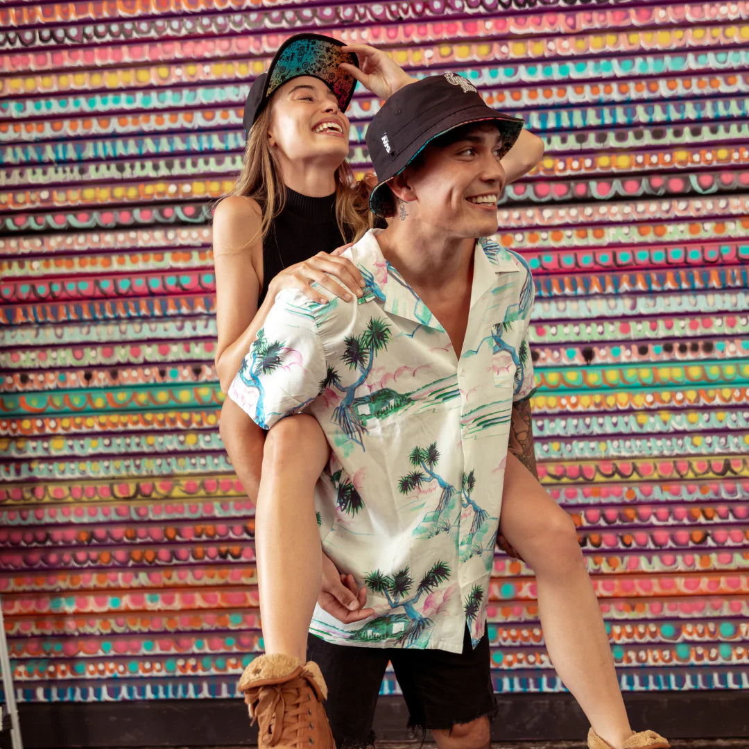 Fresh Prints Reversible Bucket Hat side black view on a male model