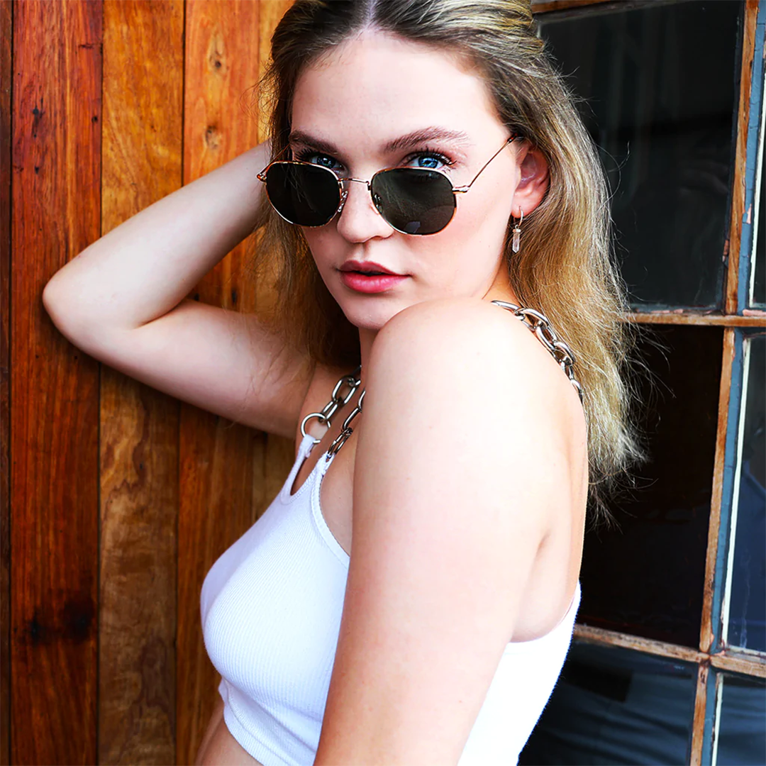 Gunner Polarised Gold Aviator Sunglasses on a female model