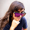 LOOSE CANNON Polarised Pink Shield Square Sunglasses on a female model