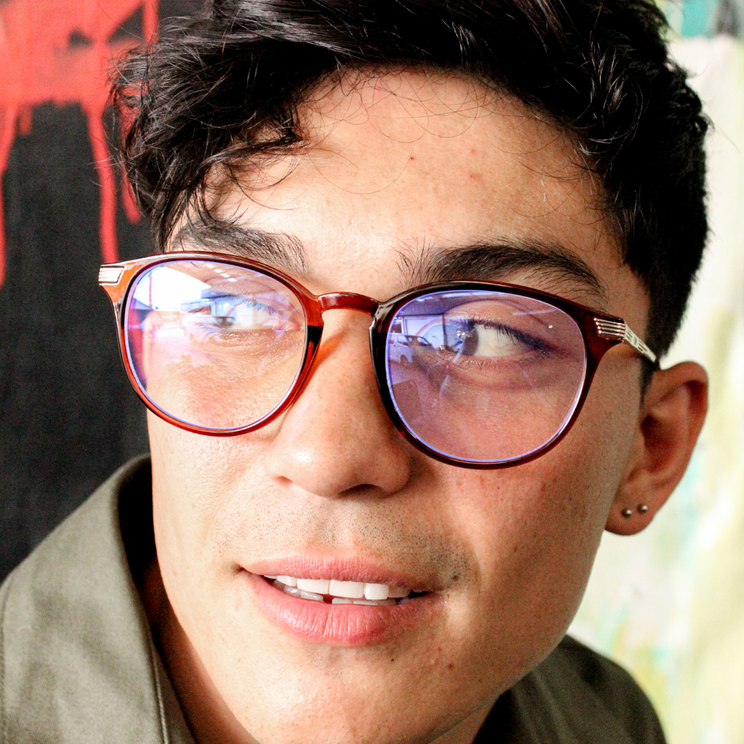 Love Child Brown Round Blue Light Glasses on a male model looking to his right